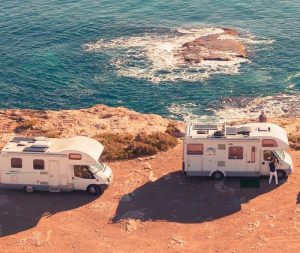 Motorhomes going on holiday by the sea